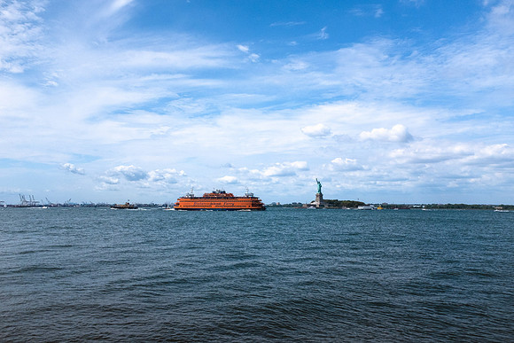 The Boat and the Lady in the Harbor